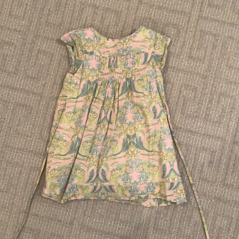 Spring Flowers boutique brand. A pink paisley dress with crystal detail